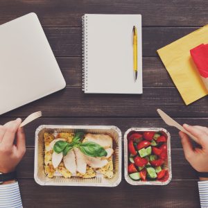 Healthy business lunch top view at table.